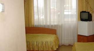 Гостиница БИЦ Тюмень Кровать в общем номере с 3 кроватями-4
